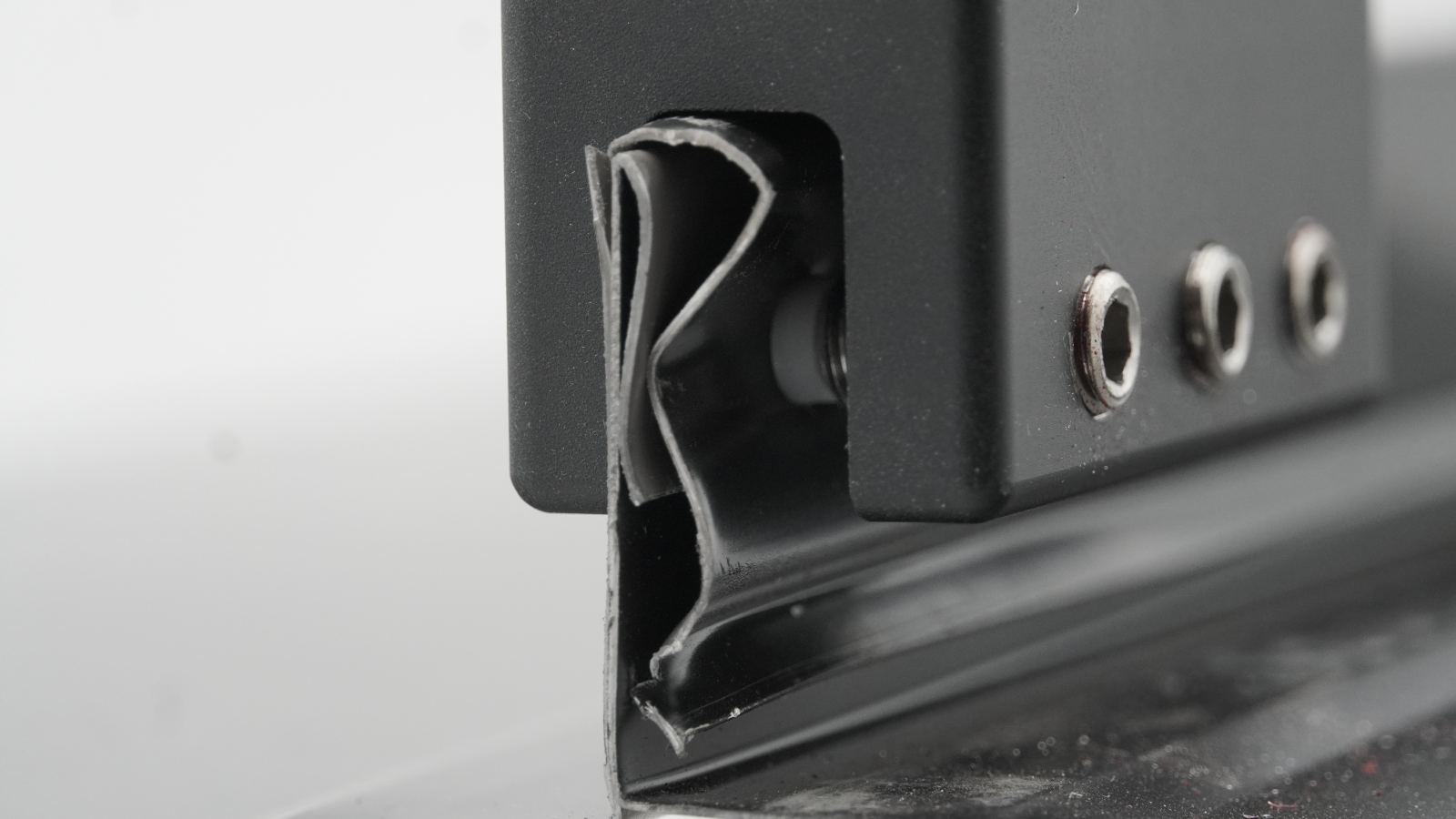 Universal Clamp seated on a standing seam